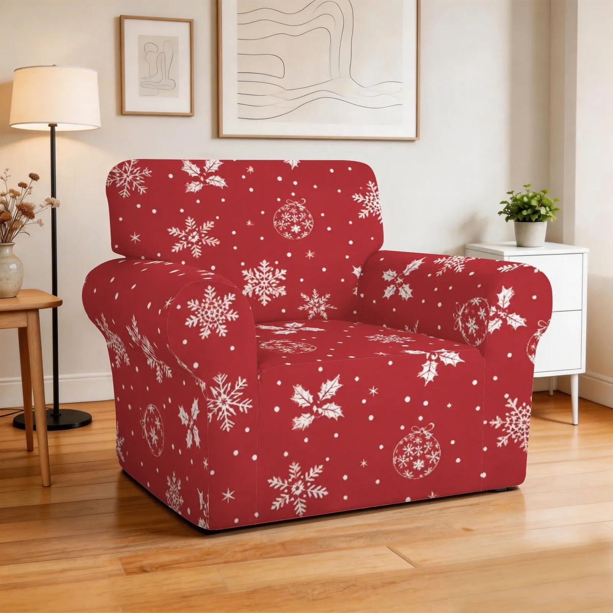 Armchair slipcover with snowflake and holly print, styled by a floor lamp