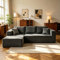 Dark gray U-shaped cloud sofa, angled view